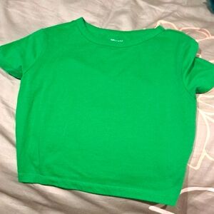 A cropped green tee